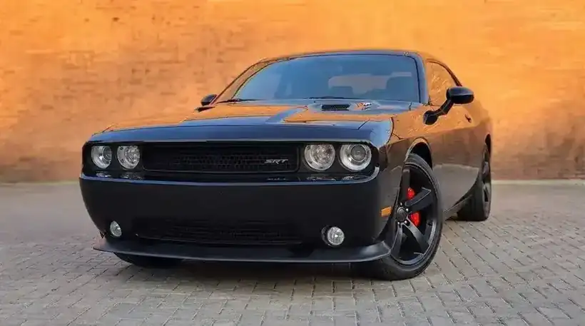 Dodge Challenger SRT 6.1L V8 — verkocht